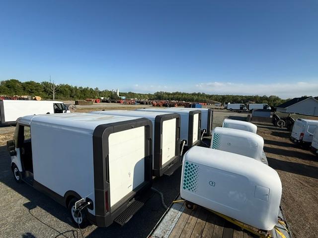 Rapid Charge EV mobile charging units staged on a flatbed trailer at a fleet depot